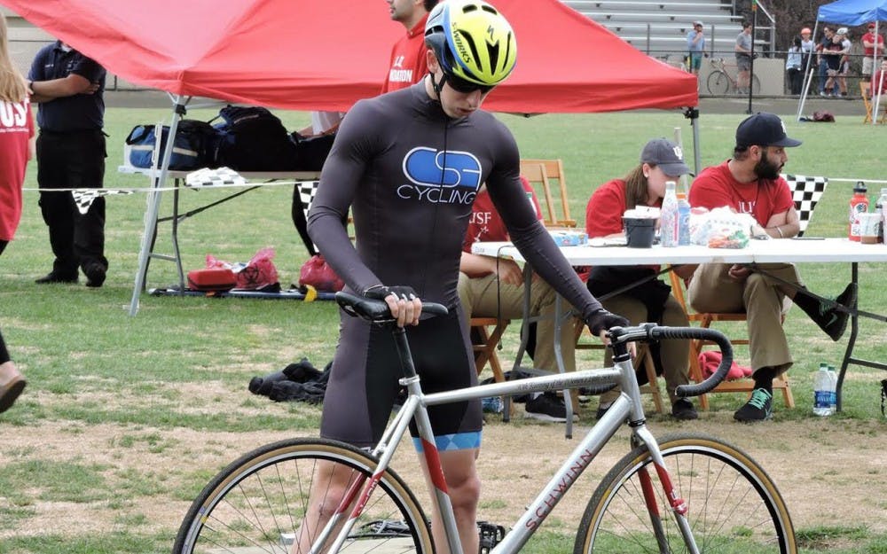 Senior Christian Student Fellowship rider Evan Lee prepares for 2017 Little 500 qualifications at Bill Armstrong Stadium in March.&nbsp;