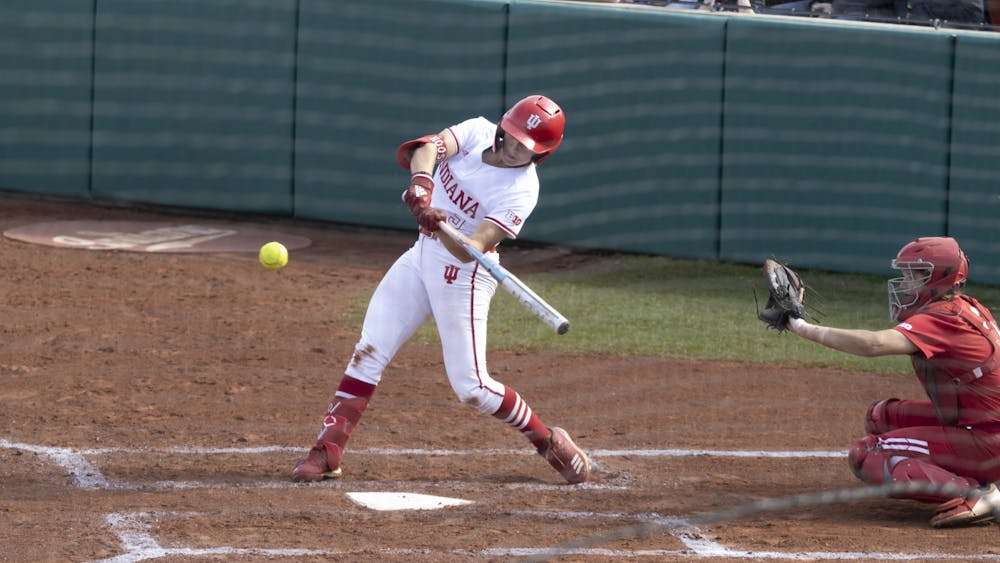 Freshman Taryn Kern swings at a pitch in a game against Wisconsin March 5, 2023, at the Andy Mohr Field. Kern&#x27;s 22 home runs are tied for first nationally. 