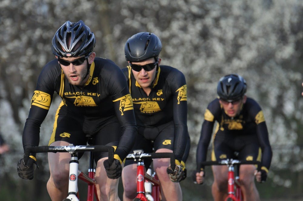 Cyclists from Black Key Bulls ride during the Team Pursuit event on Sunday at Bill Armstrong Stadium. Black Key Bulls finished first in the event.