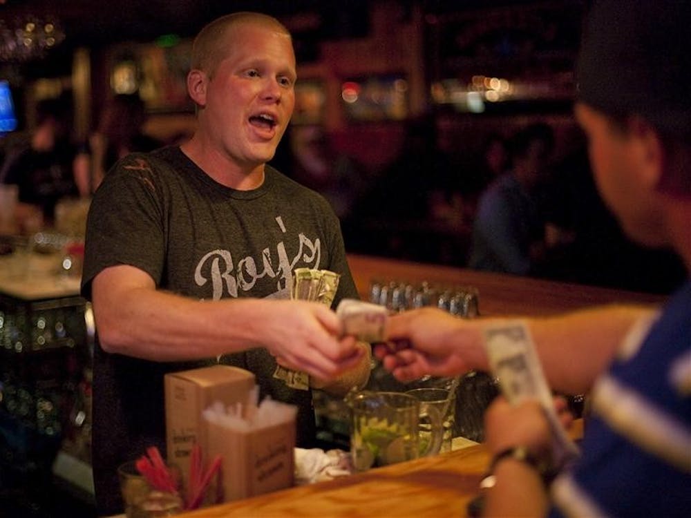 Matt Suter, Kilroy's bartender, serves a customer Tues. July 14. 