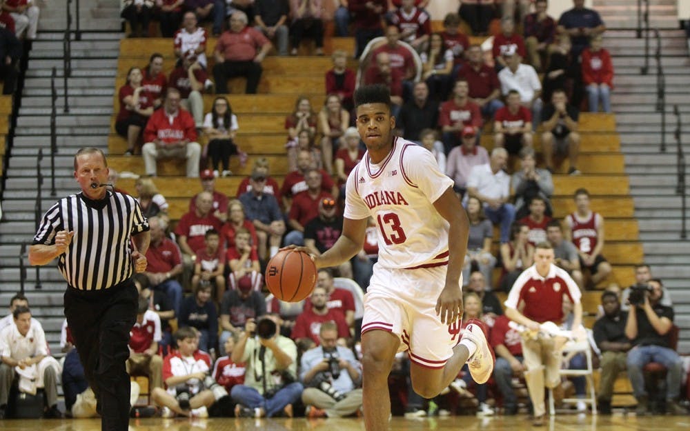 Forward Juwan Morgan dribbles the ball down the court against Hope College. The Hoosiers defeated the Flying Dutchmen 98-65 in their home opening exhibition game.