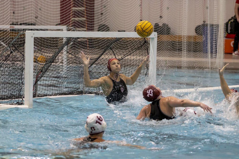 Gradute goalkepper Mary Askew defends against a shot from Stanford March 4, 2023, at Counsilman-Billingsley Aquatic Center. Indiana will play in California this weekend.