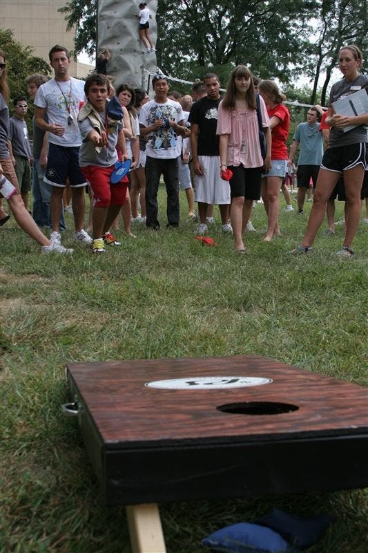 Prizes were awarded to students playing cornhole, one of several activites attracting students at Rec fest on Friday by the HPER building.  