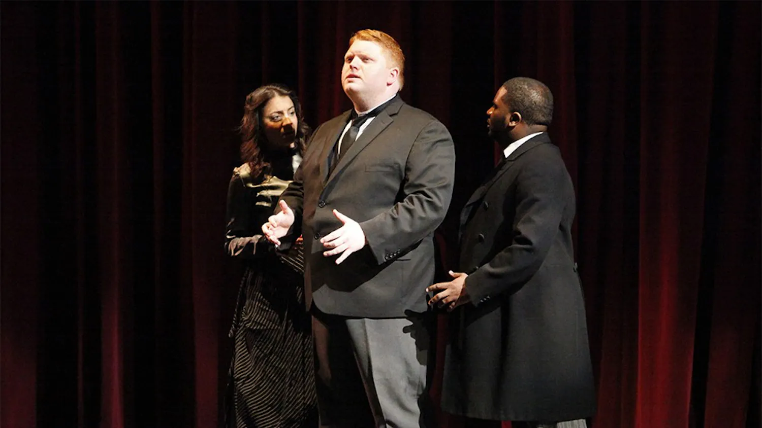 (From left) Marianthi Hatzis, Tislam Swift, and Connor Martin Lidell sing during a dress rehearsal for New Voices Opera on Thursday. The organization is performing "The King in Yellow" and "THUMP!" on Friday at the Buskirk-Chumley Theater.
