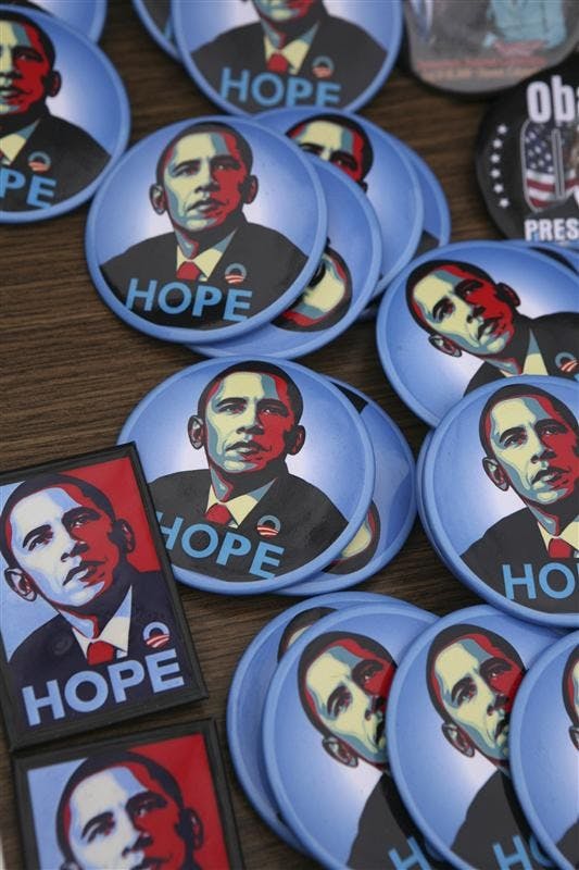 Barack Obama presidential campaign buttons are for sale by a sidewalk vendor on Monday in New York. Republican contender Sen. John McCain faces his Democratic opponent Obama on Tuesday.