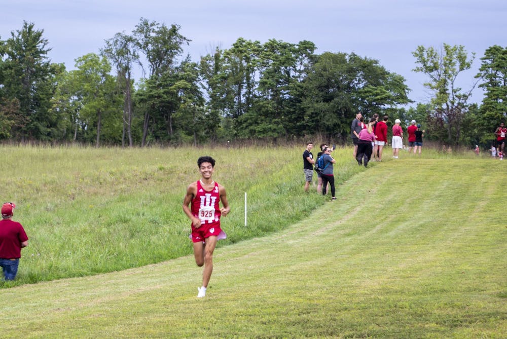 <p>Sophomore Gabriel Sanchez leads in the final stretch of the 8K race Sept. 4, 2021, on the IU Championship Course in Bloomington. Sanchez was named Big Ten Freshman of the Year for cross country.</p>