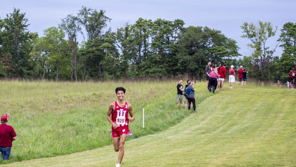 Sophomore Gabriel Sanchez leads in the final stretch of the 8K race Sept. 4, 2021, on the IU Championship Course in Bloomington. Sanchez was named Big Ten Freshman of the Year for cross country.