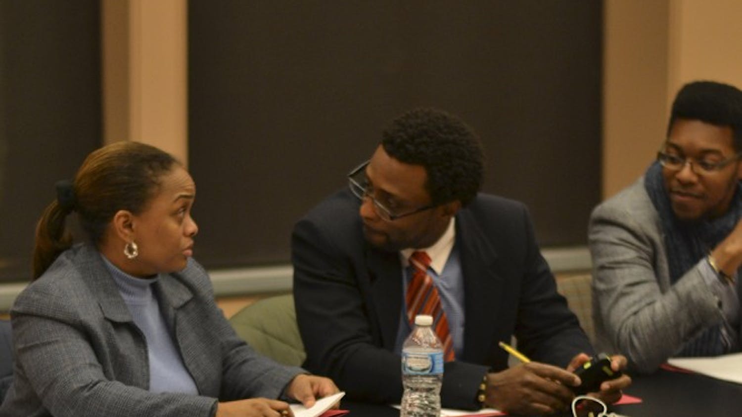 Dr. Tyron Cooper (right), director of the Soul Revu, awaits auditioners on Thursday, Jan. 15 at the Neal Marshall Black Culture Center. Dr. Cooper describes the ideal candidate as "Artistically talented, intellectual, and with a desire for performing black popular music."