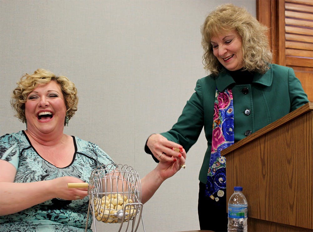State Superintendent of Public Instruction Glenda Ritz leads a Bingo for Books event with Teresa Heidenreich, library director at Washington Carnegie Pulbic Library. The event was in celebration of National Library Week. Before the Bingo began, Ritz spoke to those gathered about the importance of literacy.