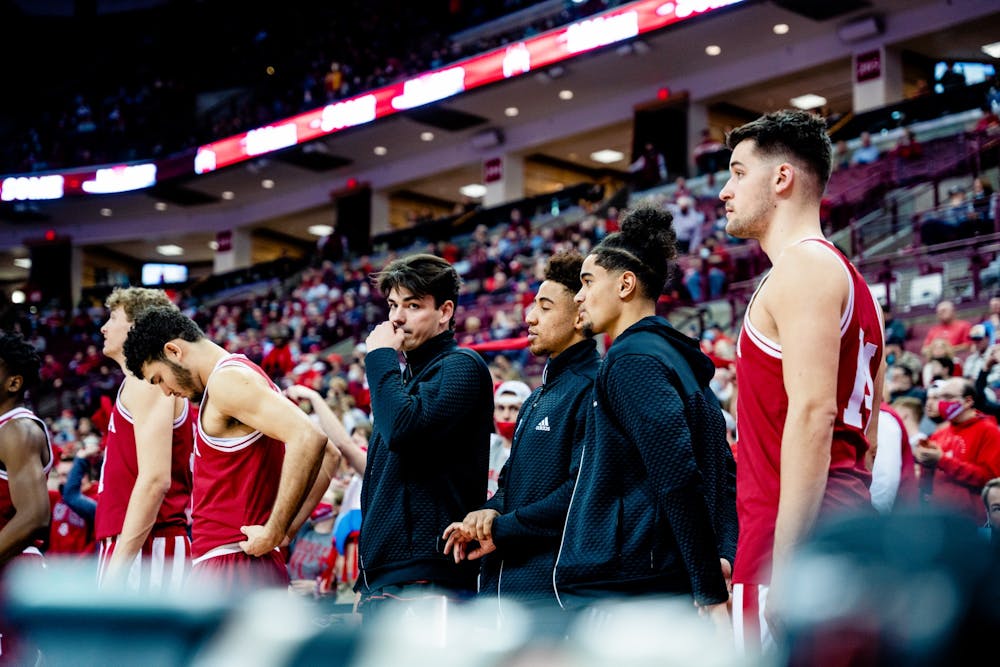 <p>Guards Trey Galloway, Rob Phinisee  and Khristian Lander watch from the bench Feb. 21, 2022, at the Schottenstein Center. Indiana will face Maryland at 7 p.m. Feb. 24 at home. </p>