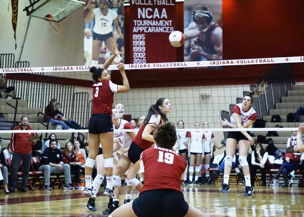 Freshman outside hitter Kamryn Malloy spikes the ball for a kill against the Wisconsin Badgers on Friday night at the University Gym. IU lost against Wisconsin and Minnesota this past weekend, dropping its overall record to 12-16.&nbsp;