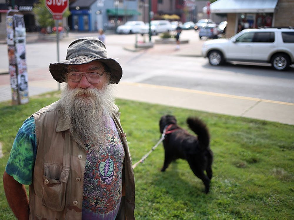 Rod Gesner, Bloomington, is known around downtown for parking his RV on Kirkwood to practice his ministry and share his wares - wooden rods that he makes. He calls his dog, Kiaayo, a "comfort/therapy wonder dog." Gesner serves as one of the few links between the homeless population on the north side of Kirkwood and the rich college kids at the bars on the south side. 