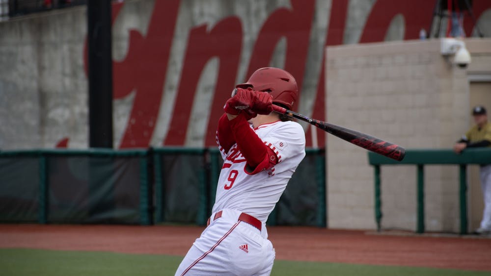 Sophomore first baseman Brock Tibbitts hits a three-run home run on March 8, 2023, against Purdue Fort Wayne at Bart Kaufman Field in Bloomington, Indiana.