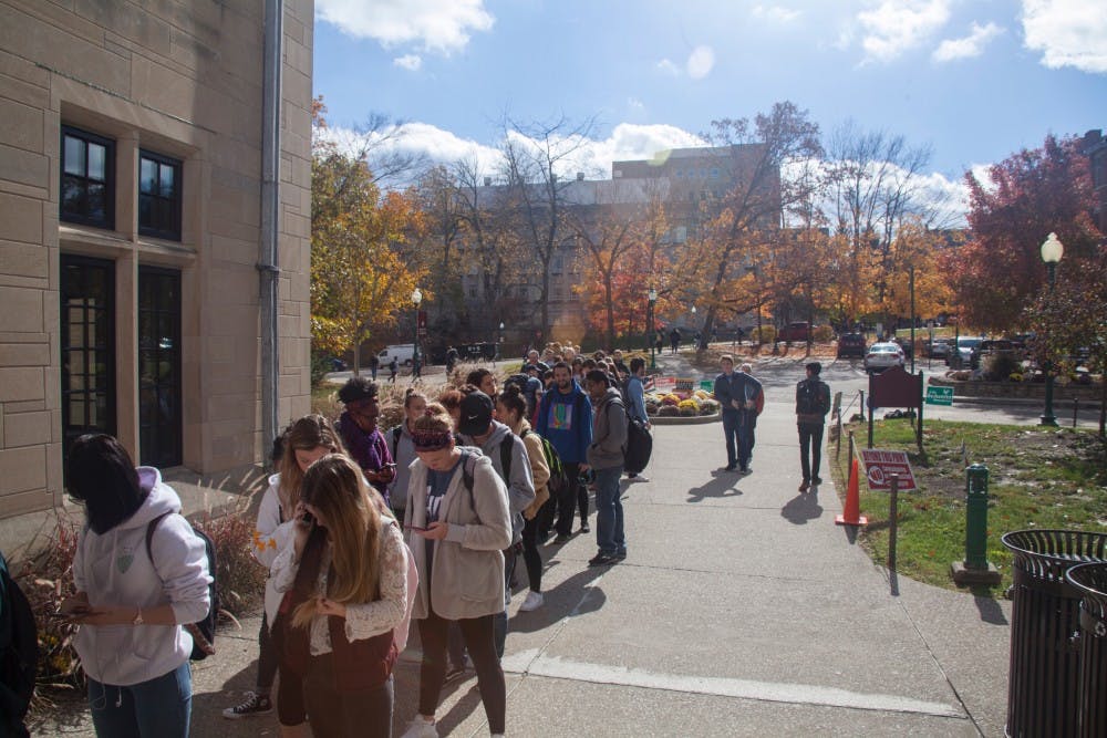 Students stand in line to vote outside the Indiana Memorial Union. As of 5 p.m., more than 46,000 Monroe County voters had cast ballots. 