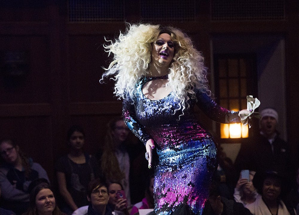Sasha Belle dances in the Condom Fashion Show at IMU Alumni Hall on Thursday. All the tips models get will be donated to Community AIDS Action Group of South Central Indiana for the 2015 AIDS Walk.