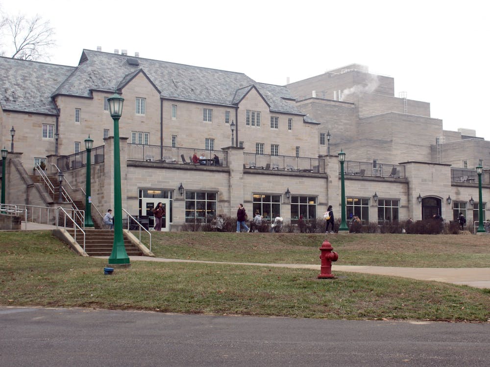 Students pass by Goodbody Dining Hall on Jan. 11, 2023. Goodbody Dining Hall offers breakfast, lunch and dinner for IU students with a carry-out option.