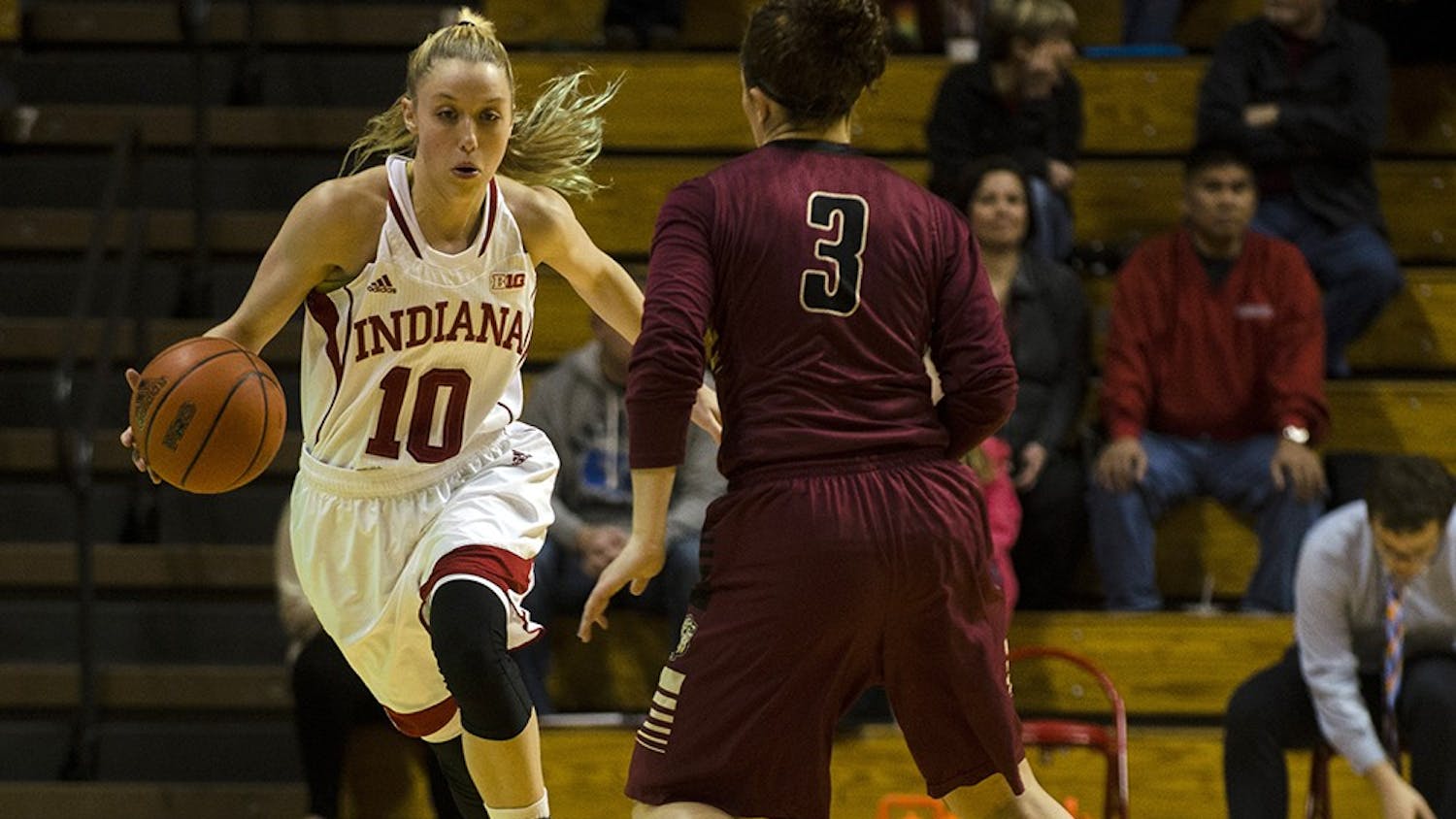 Sophomore guard Taylor Agler dribbles around IUPUI defender Sunday at Assembly Hall. The Hoosiers won 68-55 and will return to Assembly Hall next Wednesday to play Indiana University-Purdue University Fort Wayne (IPFW). 