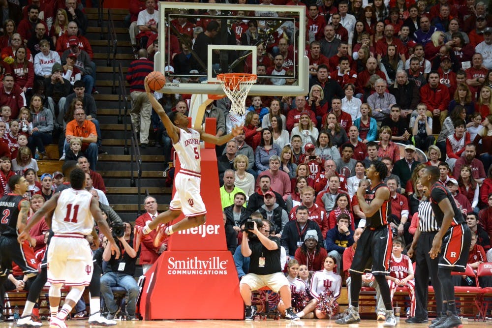 Sophomore forward Troy Williams dunks the ball during the game against Rutgers on Saturday at Assembly Hall.