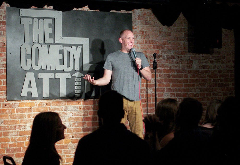 The audience gets in a good laugh as Billy Wayne Davis performs at the Comedy Attic on Thursday. This was his first appearance in Bloomington.