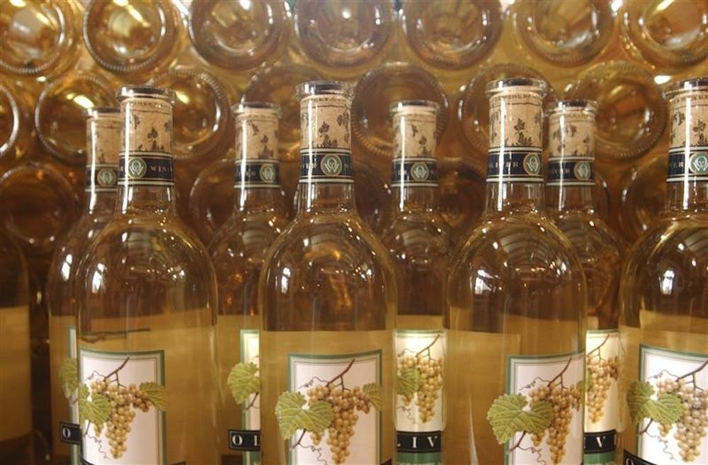 Bottles of wine are stocked at Bloomington's very own Oliver Winery. Oliver Winery is one of the featured winerys who will be particpating in "Wine Weekend" in Story, Ind., an festival that features local winerys across Indiana.