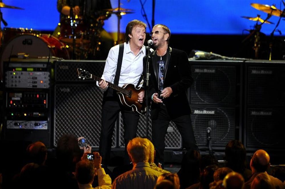 Former Beatles Paul McCartney and Ringo Starr perform at the Change Begins Within Concert, Saturday April 4, 2009 in New York.