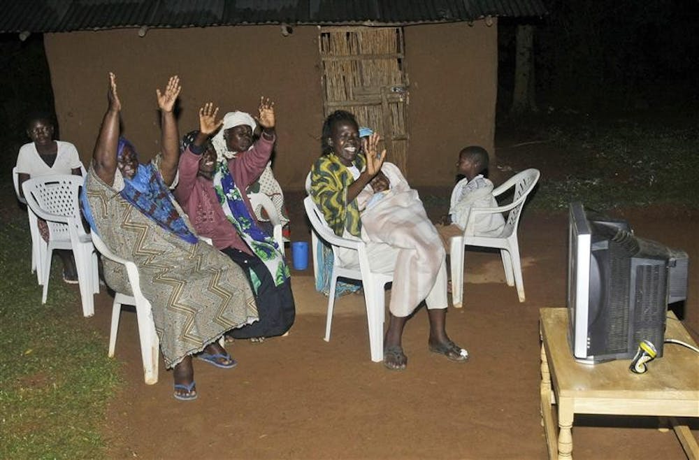 THREE CHEERS | Extended family members of President-elect Barack Obama react as election results come in at the family’s homestead on Wednesday in Kogelo village, Kenya. The village is where Obama’s step-grandmother lives. Africans organized all-night parties to watch the U.S. election results roll in, determined to celebrate Obama becoming the first black American president.