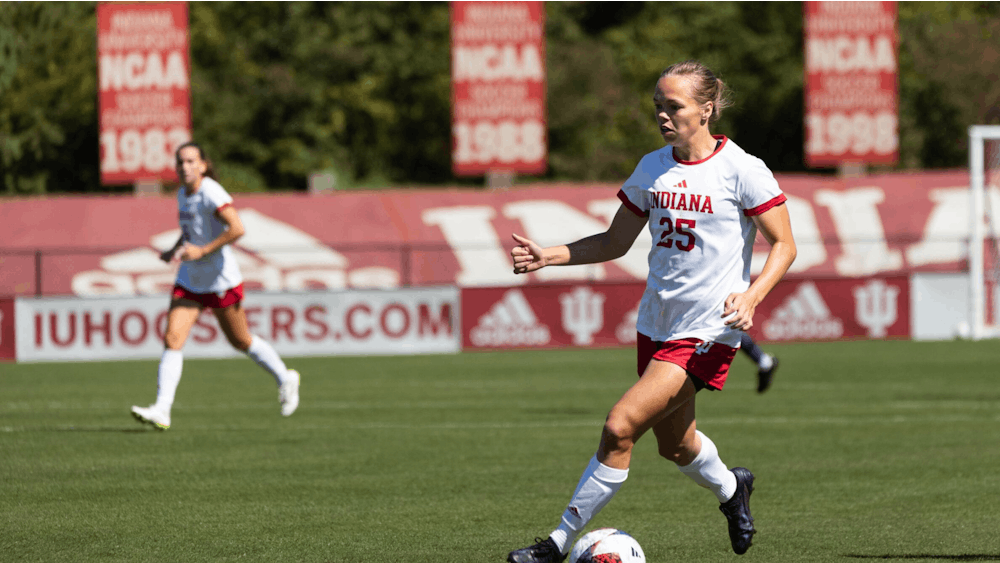Graduate forward Paige Webber dribbles the ball against Northwestern on Sept. 24, 2023, at Bill Armstrong Stadium in Bloomington. Indiana lost its first game of the season Thursday against Ohio State.