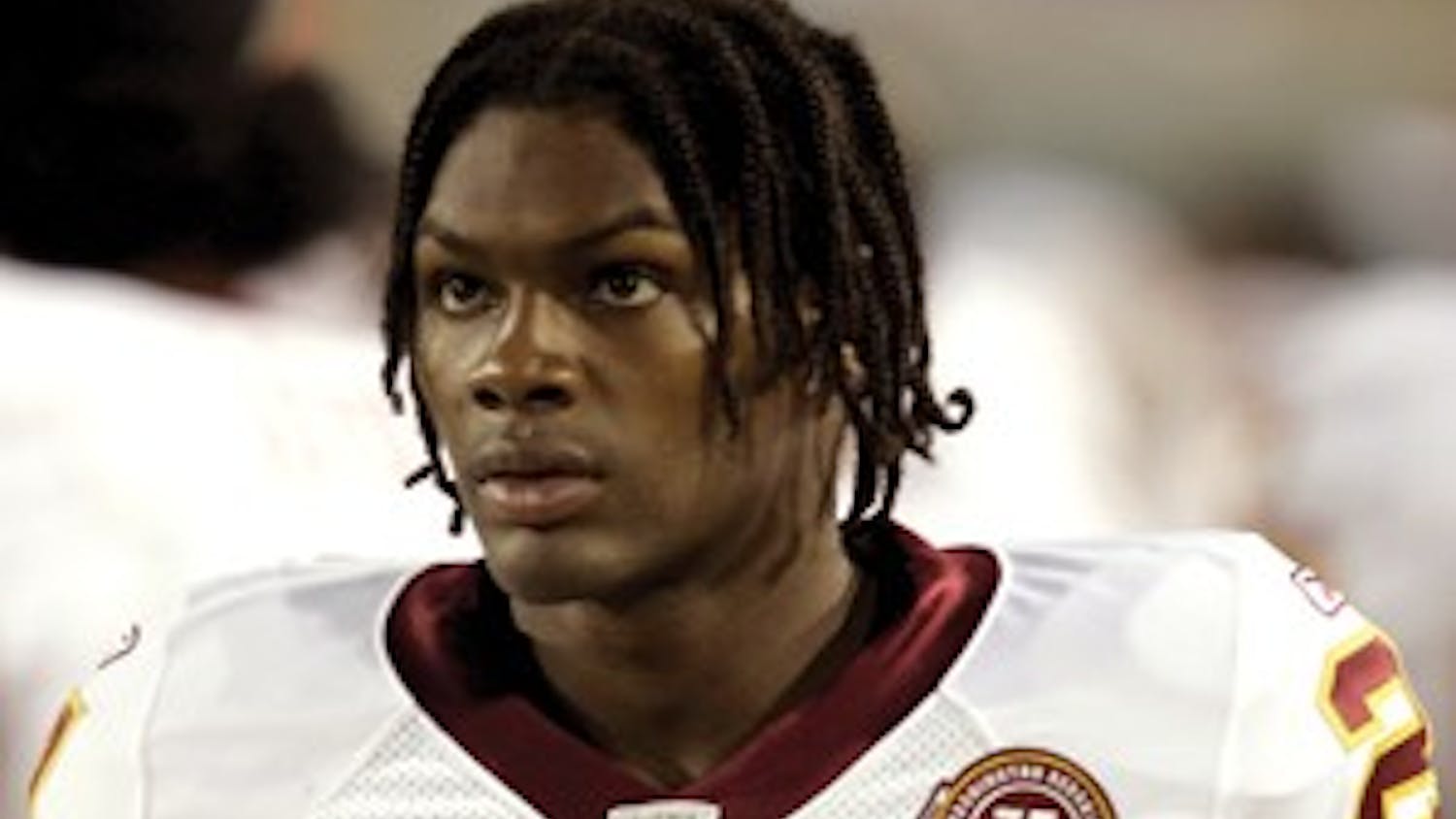 Redskins Taylor Shooting Football