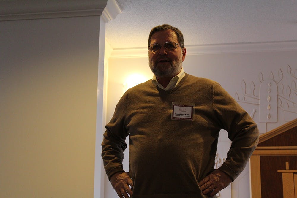 Rabbi Ron Klotz speaks during the collaborative event between IU Muslim Student Union and IU Hillel on Friday. 
