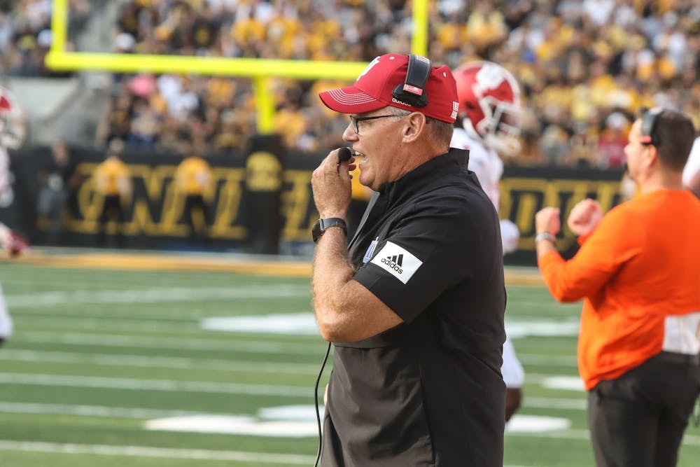 <p>Indiana football head coach Tom Allen calls a play Sept. 4, 2021, in Kinnick Stadium in Iowa City. Indiana has a 2-4 record this season. </p>