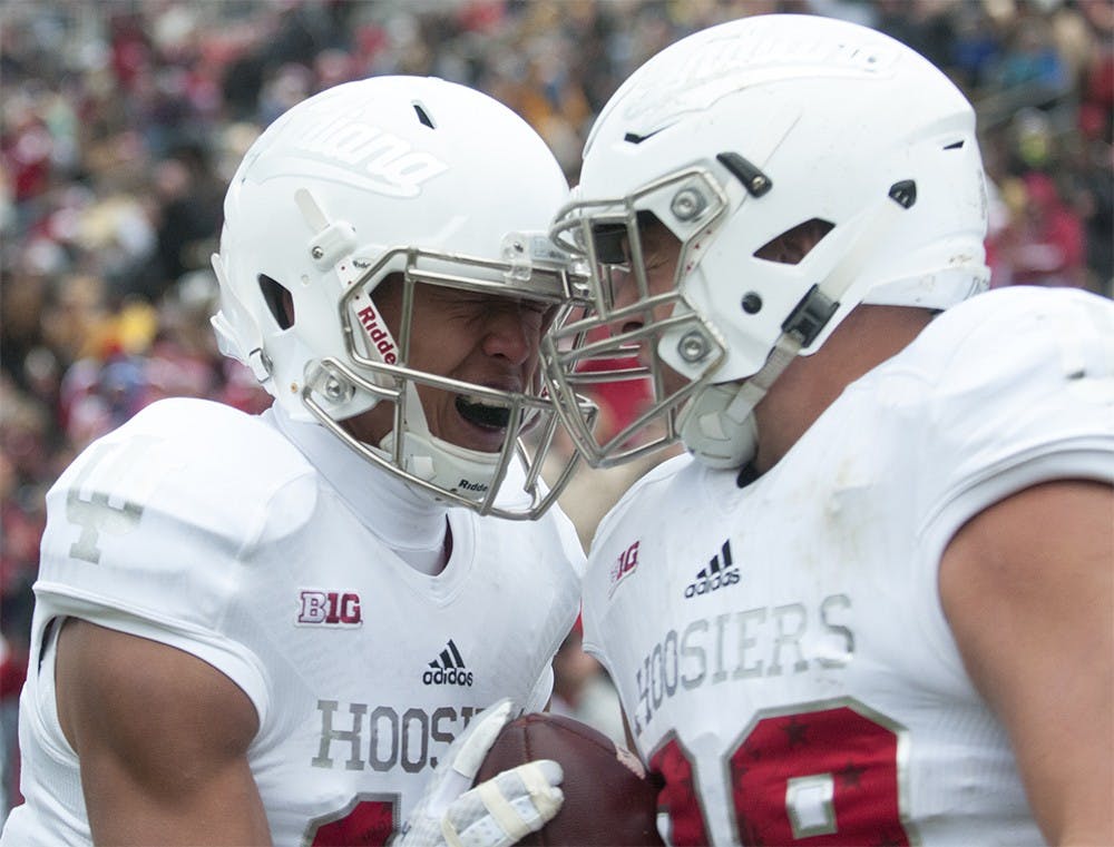Freshman wide receiver Nick Westbrook (left) and Brandon Knight (right) celebrate after Knight's touchdown against Purdue on Saturday at Ross-Ade Stadium. The Hoosiers won 54-36.