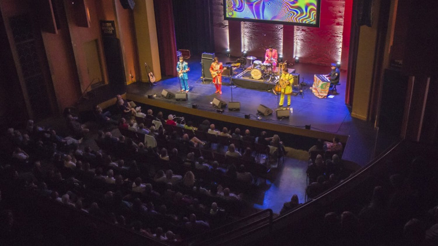 The Mersey Beatles play their set Friday night at the Buskirk-Chumley Theater, which was packed for the tribute band's third performance in Bloomington. All of the Mersey Beatles are from from Liverpool, the hometown of the original Beatles quartet. 