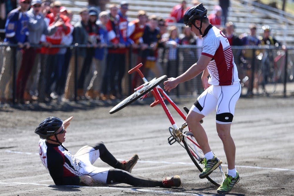 Members of Theta Chi's team fault during an exchange during Little 500 Qualifications on Saturday at Bill Armstrong Stadium. Theta Chi finished in 25th place with a time of 2:32.94.