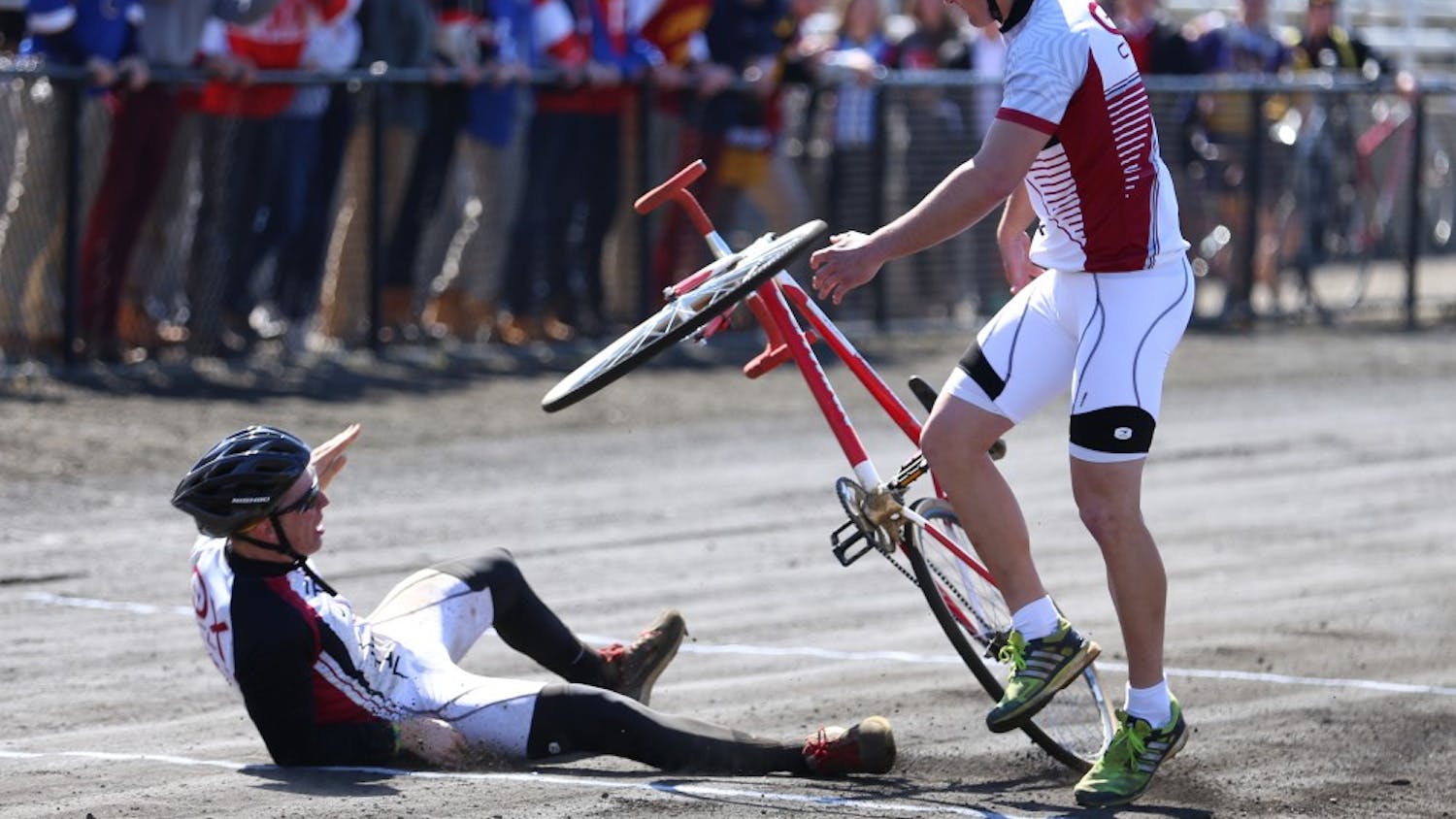 Members of Theta Chi's team fault during an exchange during Little 500 Qualifications on Saturday at Bill Armstrong Stadium. Theta Chi finished in 25th place with a time of 2:32.94.