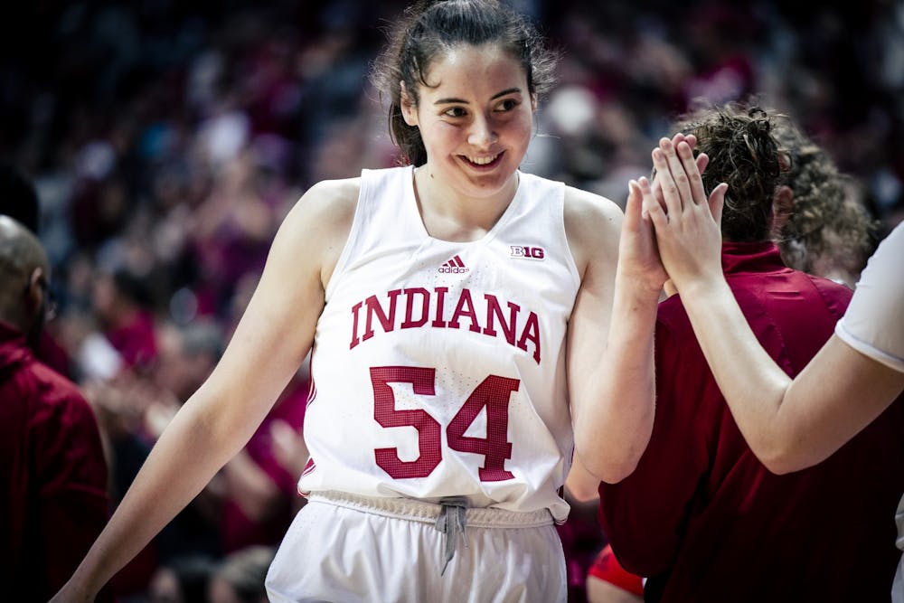 Senior forward Mackenzie Holmes celebrates Feb. 19, 2023, at Simon Skjodt Assembly Hall in Bloomington, Indiana. Indiana was awarded a 1-seed for the NCAA Tournament on Sunday.