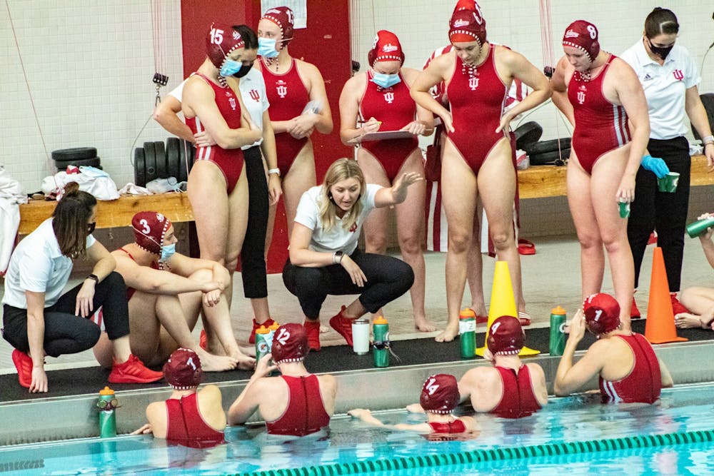 <p>Head coach Taylor Dodson talks to the Hoosiers prior to their April 13 Water Polo match against the University of California at Los Angeles at Counsilman-Billingsley Aquatic Center. The Hoosiers will compete against San Jose State this weekend. </p>
