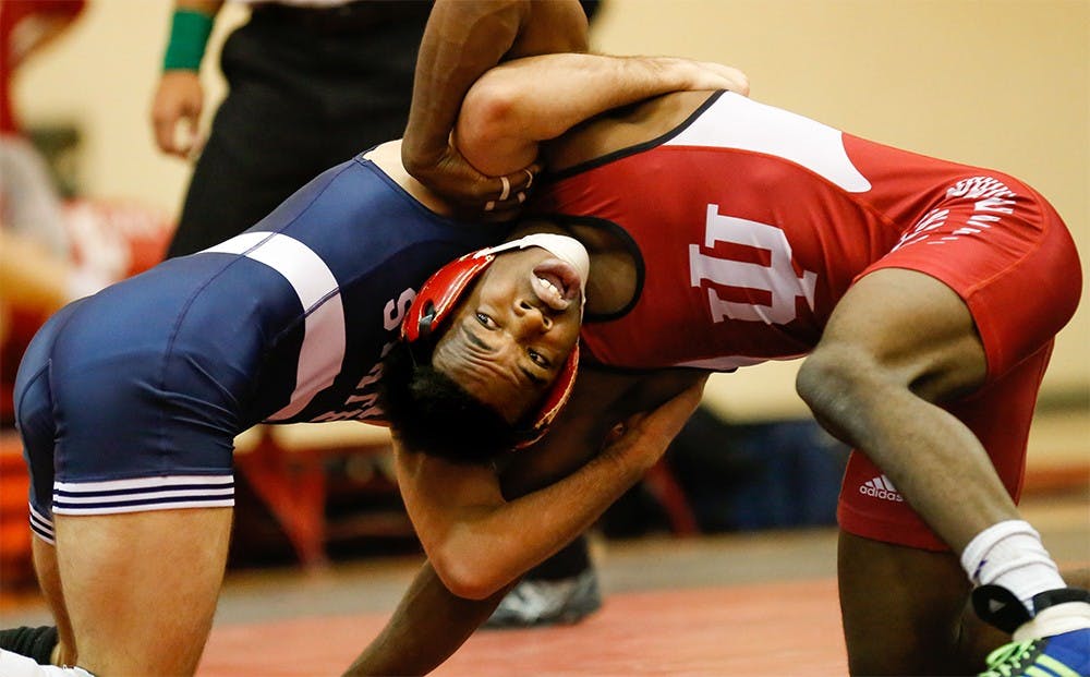 Elijah Oliver, right, has a 125 lbs match with Nico Megaludis Jan. 10 at University Gym. 