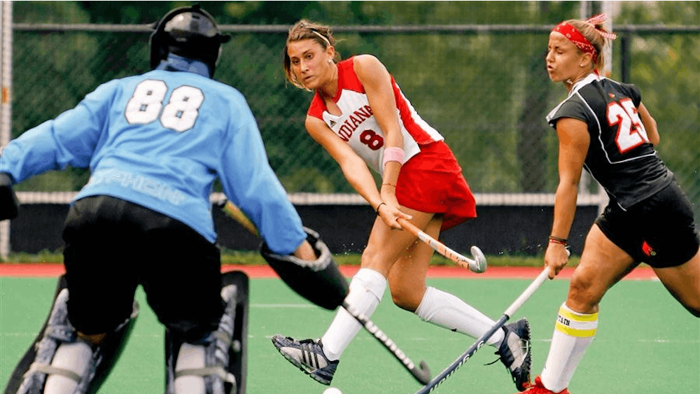 Junior forward Alina Valenti takes a goal shot during the Hoosiers 4-1 scrimmage loss to Louisville Aug. 24 at the IU Field Hockey field.
