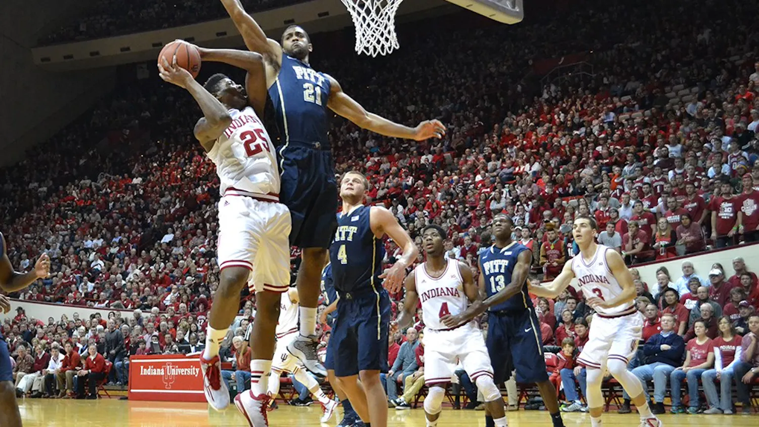 Freshman Emmit Holt has his shot contested by a Pittsburgh player during IU's game against the Panthers on Tuesday at Assembly Hall.