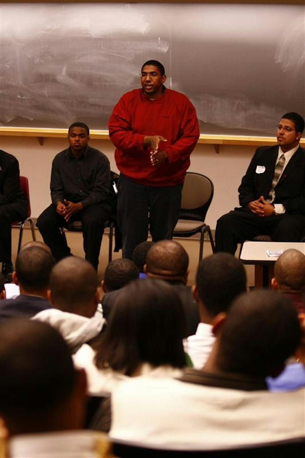 Reverend Jermaine Robinson speaks about mentoring within the African American community during the Men of Color Leadership Conference Friday afternoon at the Neal Marshall Black Cultural Center.