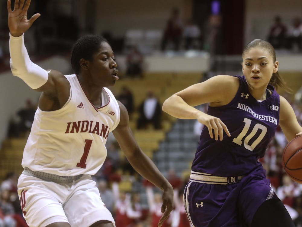 Indiana Then-sophomore, now-junior guard Bendu Yeaney guards Northwestern then-sophomore, now-junior guard Lindsey Pulliam on a drive to the basket in the first half of the women’s basketball game Jan. 16.