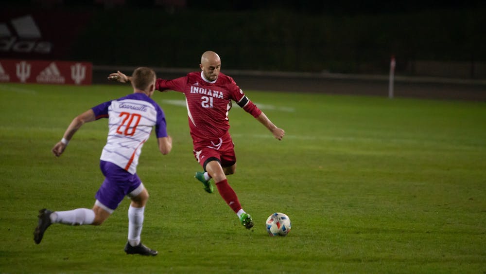 Senior defender Spencer Glass goes to kick the ball Oct. 20, 2021, in Bill Armstrong Stadium. Indiana plays Virginia Commonwealth University at 7 p.m. Wednesday at Bill Armstrong Stadium.