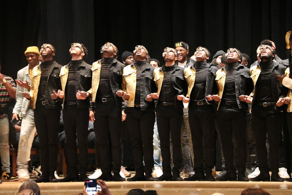 <p>New members of Alpha Phi Alpha are introduced onstage at the fraternity’s probate 7 p.m. Feb. 22, 2020, in Alumni Hall. The organizations in the Divine Nine intend for Black students to form personal connections with people who have similar backgrounds.</p>