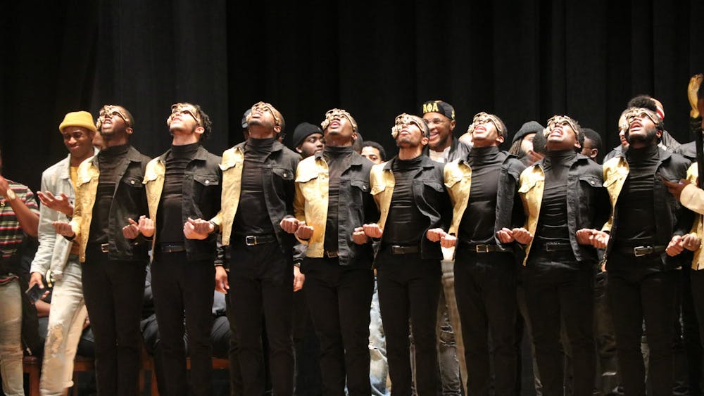 New members of Alpha Phi Alpha are introduced onstage at the fraternity’s probate 7 p.m. Feb. 22, 2020, in Alumni Hall. The organizations in the Divine Nine intend for Black students to form personal connections with people who have similar backgrounds.