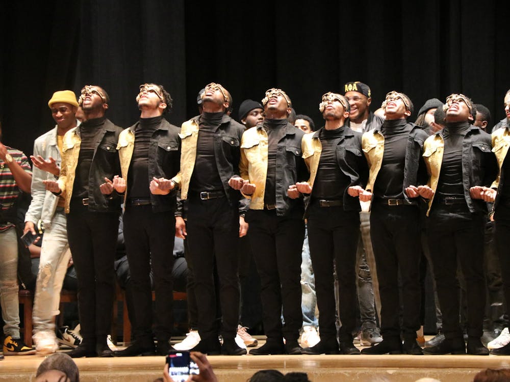 New members of Alpha Phi Alpha are introduced onstage at the fraternity’s probate 7 p.m. Feb. 22, 2020, in Alumni Hall. The organizations in the Divine Nine intend for Black students to form personal connections with people who have similar backgrounds.