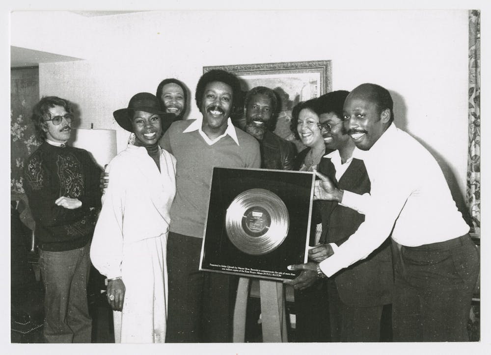 <p>Eddie Gilreath (middle) is presented with a Gold Record award from Tom Draper (right) for Rose Royce&#x27;s album &quot;In Full Bloom&quot; in 1978. The IU Archives of African American Music and Culture will premiere its documentary series, titled &quot;AAMC Speaks,&quot; on Feb. 12 on YouTube. </p>