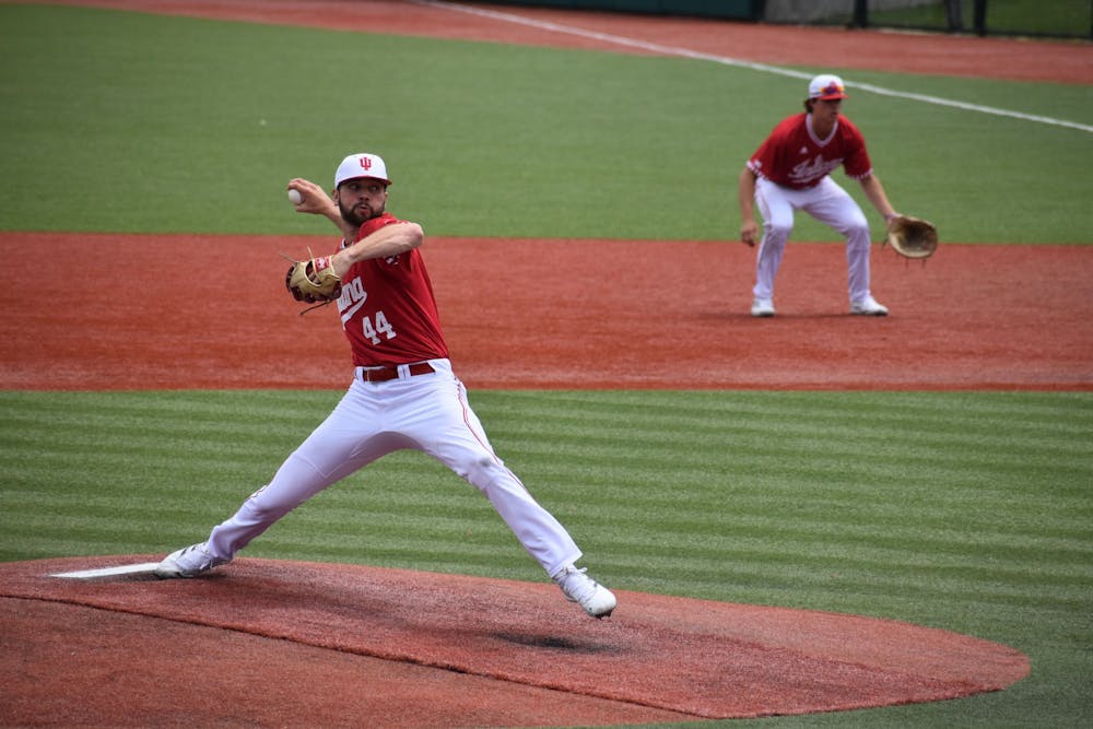<p>Senior pitcher Bradley Brehmer throws a pitch April 30, 2022, at Bart Kaufman Field. Brehmer pitched the first complete game by a Hoosier in the Big Ten Tournament since 2013. </p>