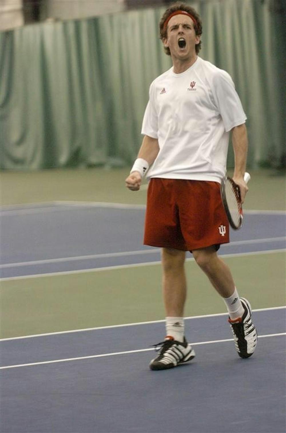 Sophomore Lachlan Ferguson celebrates after winning a point. Ferguson defeated No. 82 Marc Dwyer 6-0, 6-1.