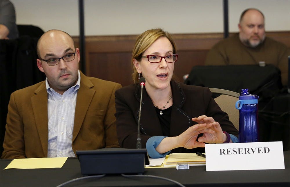 Emily Springston, chief student of Welfare & Title IX Officer, answers the question duirng the Bloomington Faculty Council meeting Tuesday at the IMU Solarium. The panels discussed about sexual assault climate survey on the campus report. 