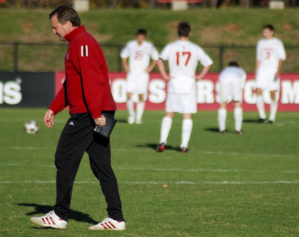 Men's soccer head coach Mike Freitag walks off the field after an IU's loss to Ohio State  at Bill Armstrong Stadium. 